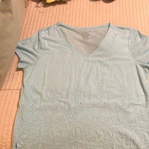 Light blue tee shirt.  Embroidered.